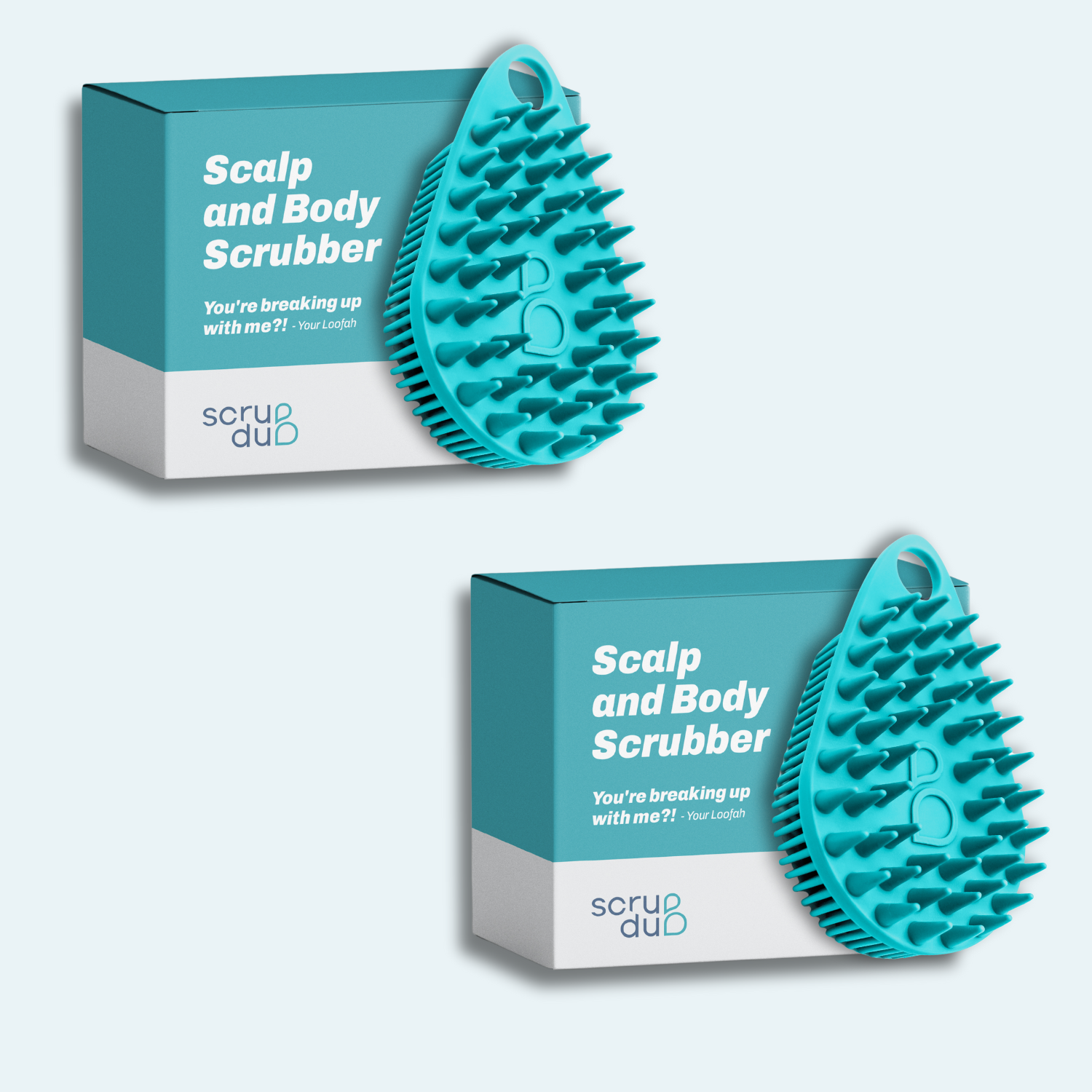 The Scrub-dub® Scalp and Body Scrubber by Scrub-dub® comes in a set of two teal scrubbers with playful packaging that reads: "Scalp and Body Scrubber - You're breaking up with me?! - Your Looffa." Featuring exfoliating bristles, these scrubbers provide a refreshing head-to-toe wash.