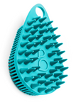 A blue hair brush for Scalp and Body Scrubber - Tahiti Teal by Scrub-dub™ on a white background.