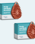 Two *scrub-dub®* Scalp and Body Scrubbers, featuring spiky textures in a vibrant orange hue, are designed to exfoliate the skin smoothly and are showcased with their sleek blue and white packaging.