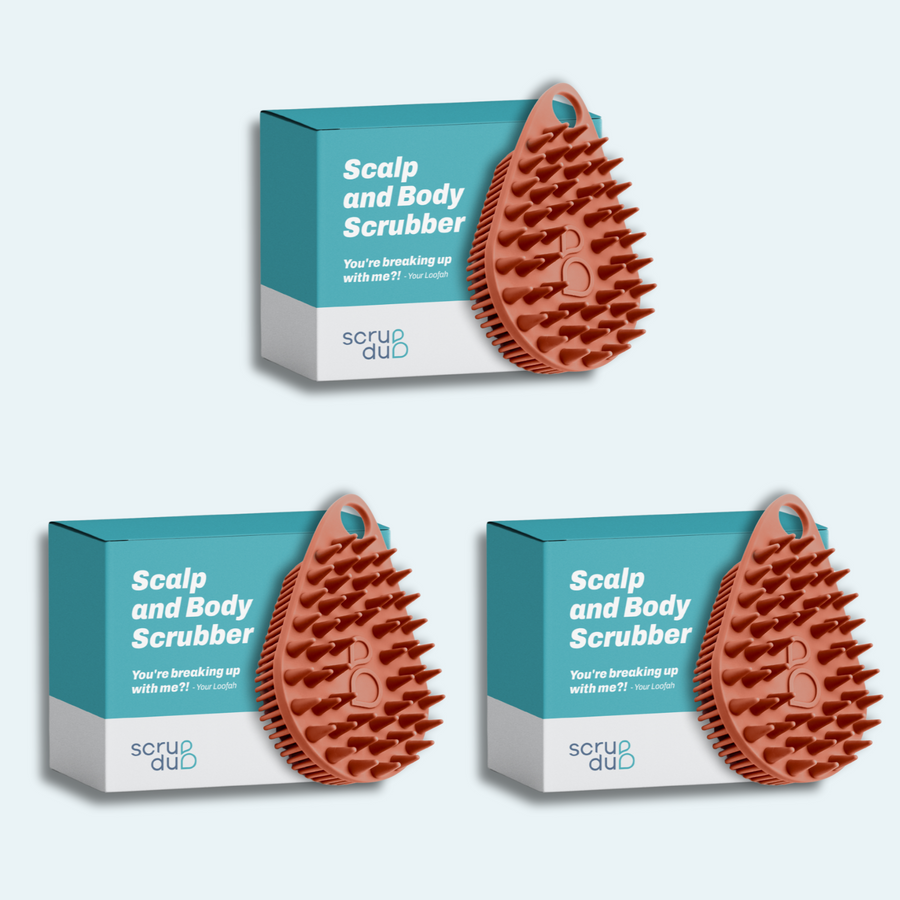 Three boxes of The scrub-dub® Scalp and Body Scrubber by Scrub-dub®, featuring a spiked design ideal for exfoliating skin, are arranged in a grid on a light blue background.