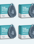 Four teal boxes labeled "The scrub-dub® Scalp and Body Scrubber" from Scrub-dub® are shown, each featuring a blue spiky scrubber designed for effective skin exfoliation.