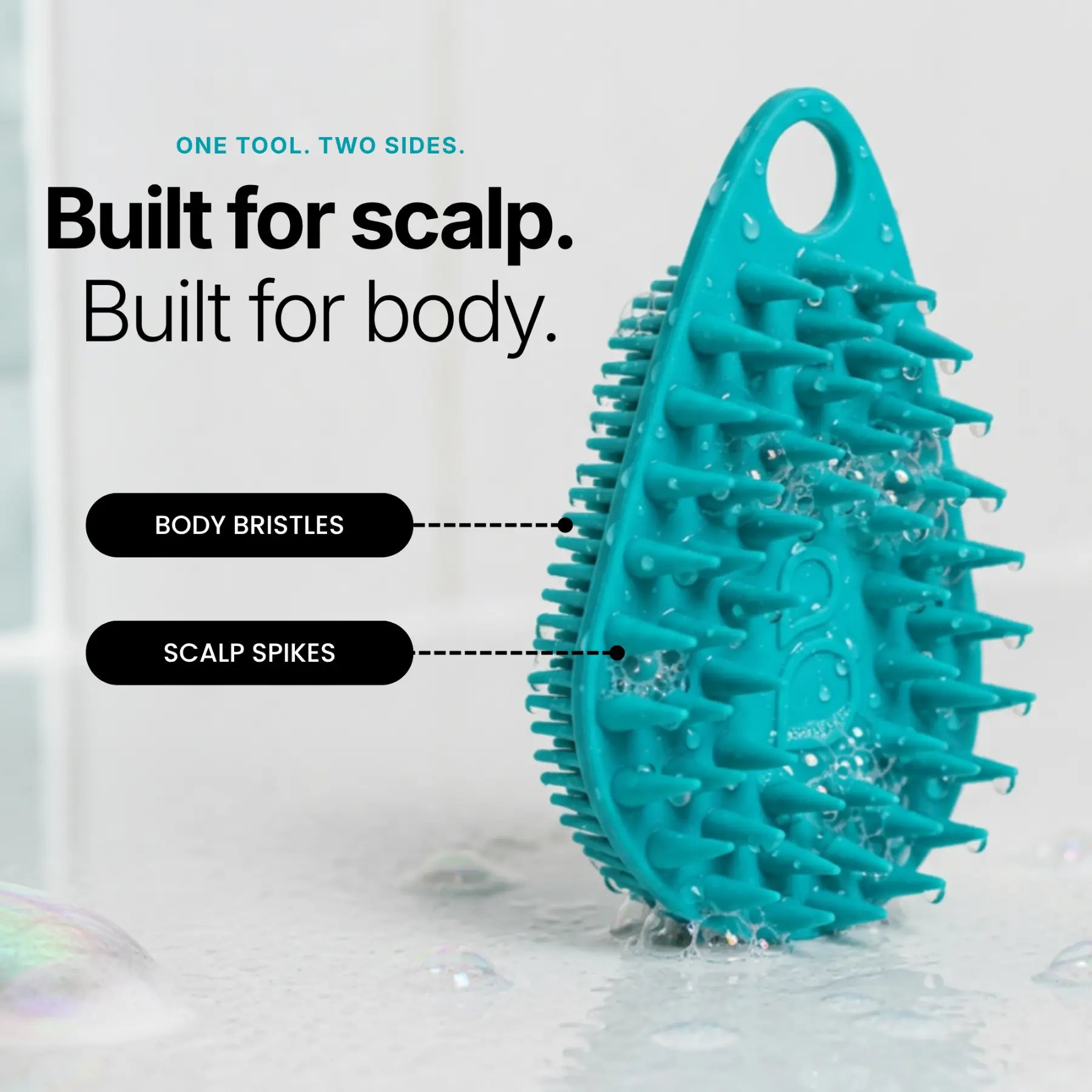 Scrub-Dub® scalp scrubber with body bristles and scalp spikes, designed for effective exfoliation and cleansing.